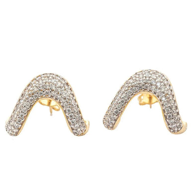 Pendiente Mini vuelta organico dorada con plata martillada en baño de oro18k

Delicado y elegante.

Joyas hipoalergenicas y sin niquel