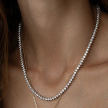 Cargar imagen en el visor de la galería, Collar Riviere 3mm circonitas modelo 3 garras en plata925 en baño de rodio, con cierre de joia.

Tamaño 3mm 42cm.

Una verdadeira joia, delicada y fashion para mesclar con otros collares WAL Barros.

joyas hipoalergénicas y sin níquel.
