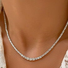Cargar imagen en el visor de la galería, Collar riviere 2mm degrade con 3 tamaños de circonitas 4mm, 3mm y 2mm arriba, en el centro en plata 925 con baño de rodio.

2Mm en su largura con  42cm

una joya perfecta para mesclar con otras joyas.
