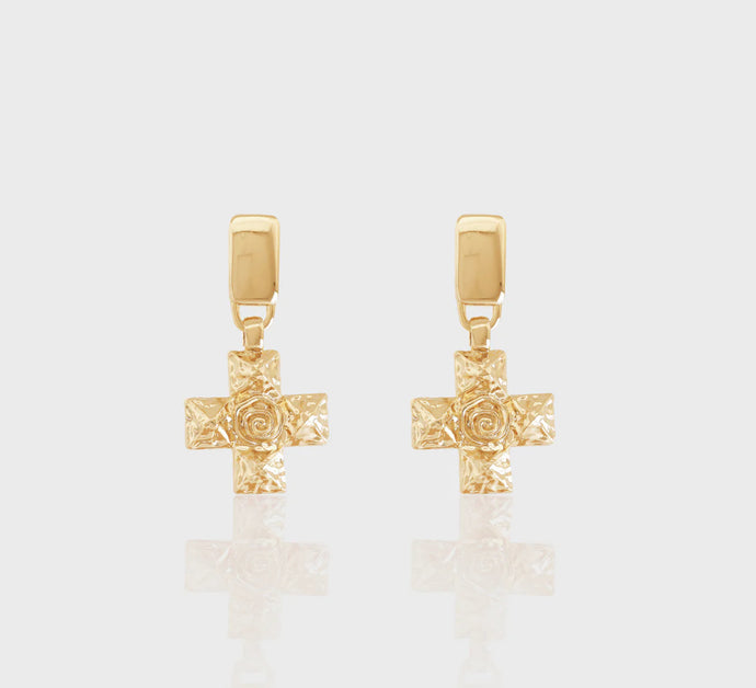Pendiente cruz martilado em banho de ouro 18k .Tendencia de moda.

Super comoda e leve. Hipoalérgicas e sem niquel.