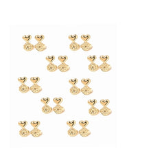 Cargar imagen en el visor de la galería, Tarraxa de soporte con corazón chapado en oro de 18k. Ideal para quienes buscan más seguridad sin renunciar a la estética, es el detalle que marca la diferencia tanto en el uso como en la composición de sus accesorios.
