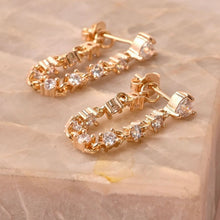 Cargar imagen en el visor de la galería, pendiente riviere dorado en baño de oro
